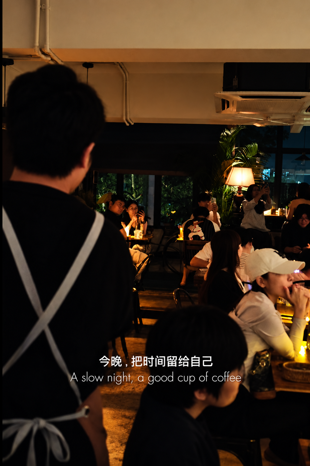 Warm night café atmosphere and customers at Fishee Coffee Kuala Lumpur