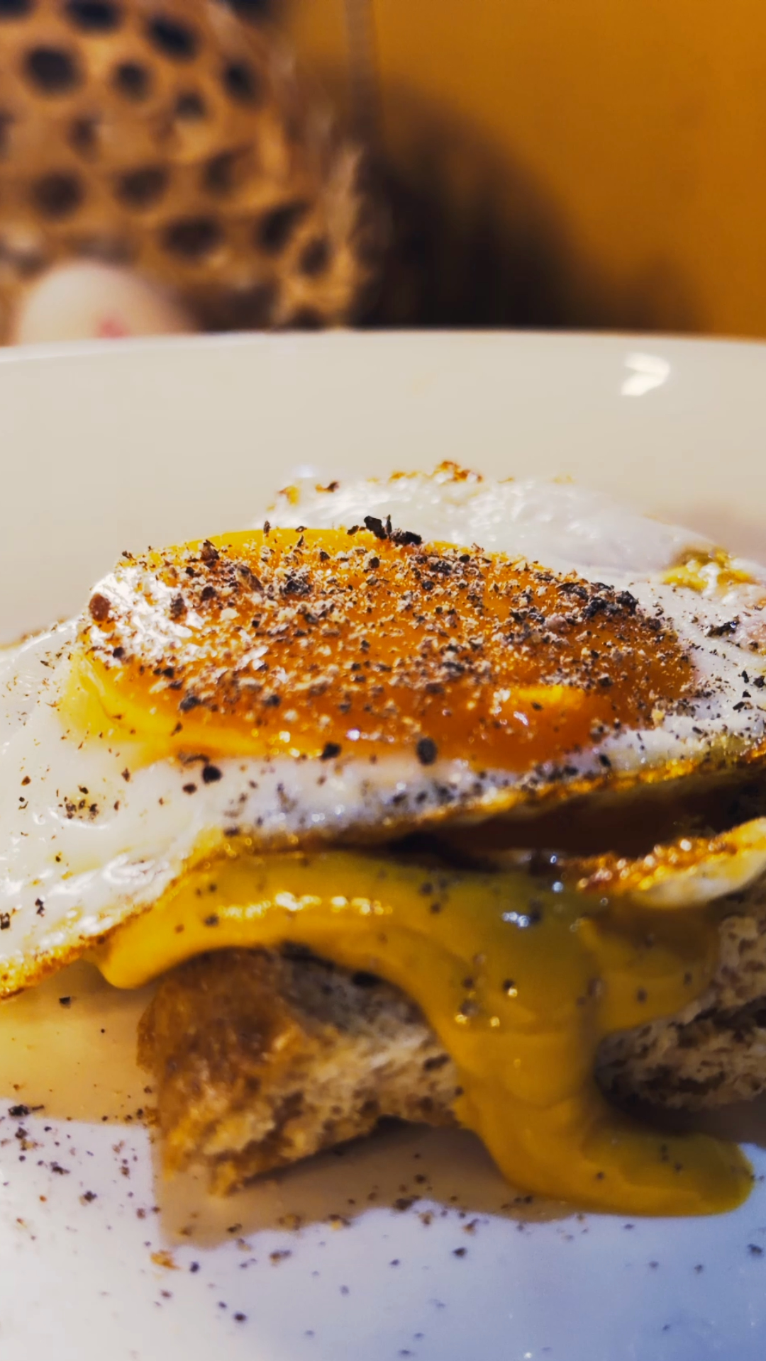 Cinematic close-up of a fried egg on toast from EGG / MORNING spec film